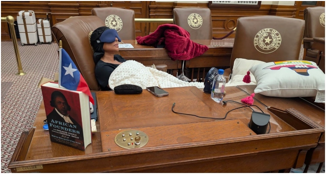 Rep. Nicole Collier sleeps on the floor of the Texas House of Representatives in Austin, Aug. 18, 2025.
Rep. Gene Wu/Texas House Democratic Caucus